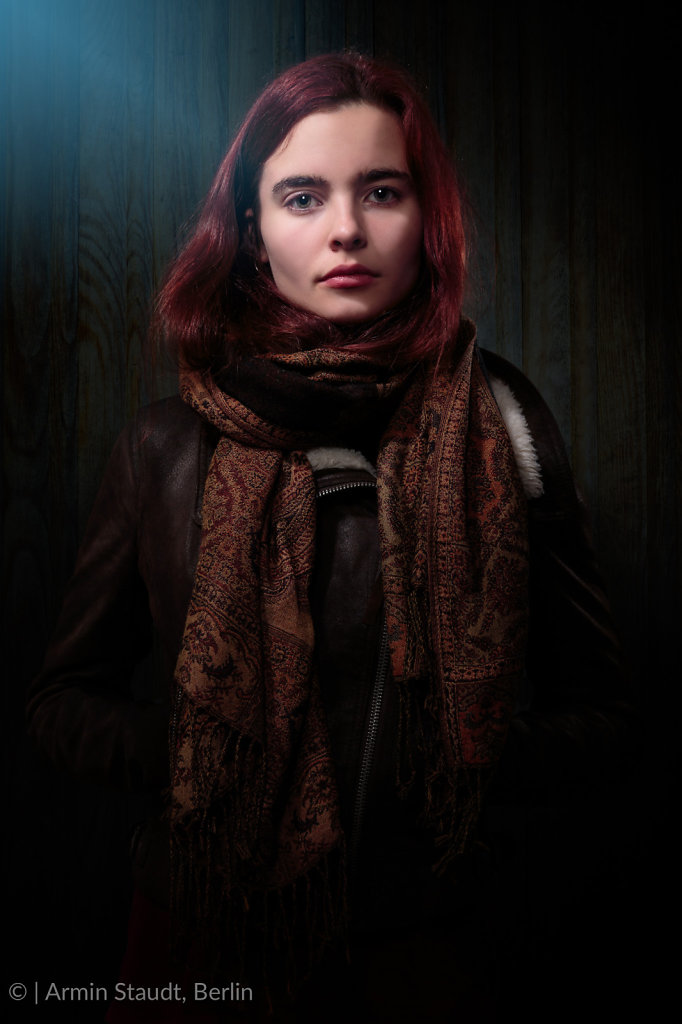 portrait of a strict looking woman with leather jacket 