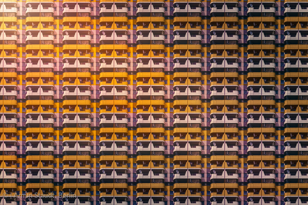 architectural pattern, facade with yellow balconies of a skyscraper